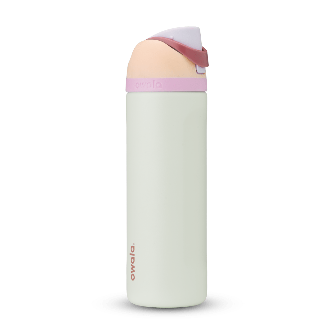 Owala FreeSip 24oz in Out of the Blue, periwinkle blue insulated bottle with matching blue-lavender flip cap and carry loop