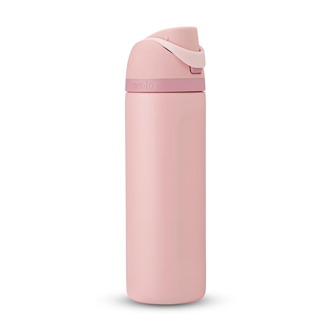 Owala FreeSip 24oz in Out of the Blue, periwinkle blue insulated bottle with matching blue-lavender flip cap and carry loop