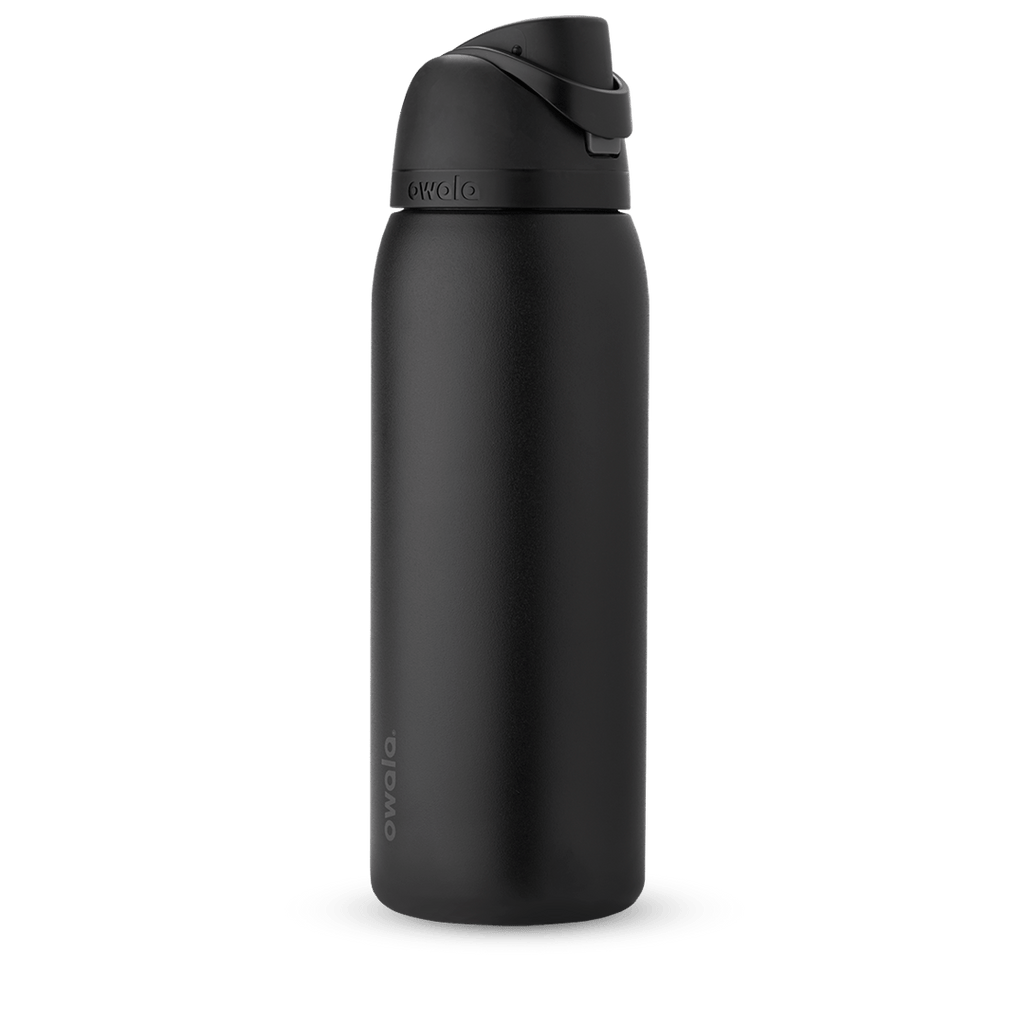 Owala FreeSip 24oz in Out of the Blue, periwinkle blue insulated bottle with matching blue-lavender flip cap and carry loop