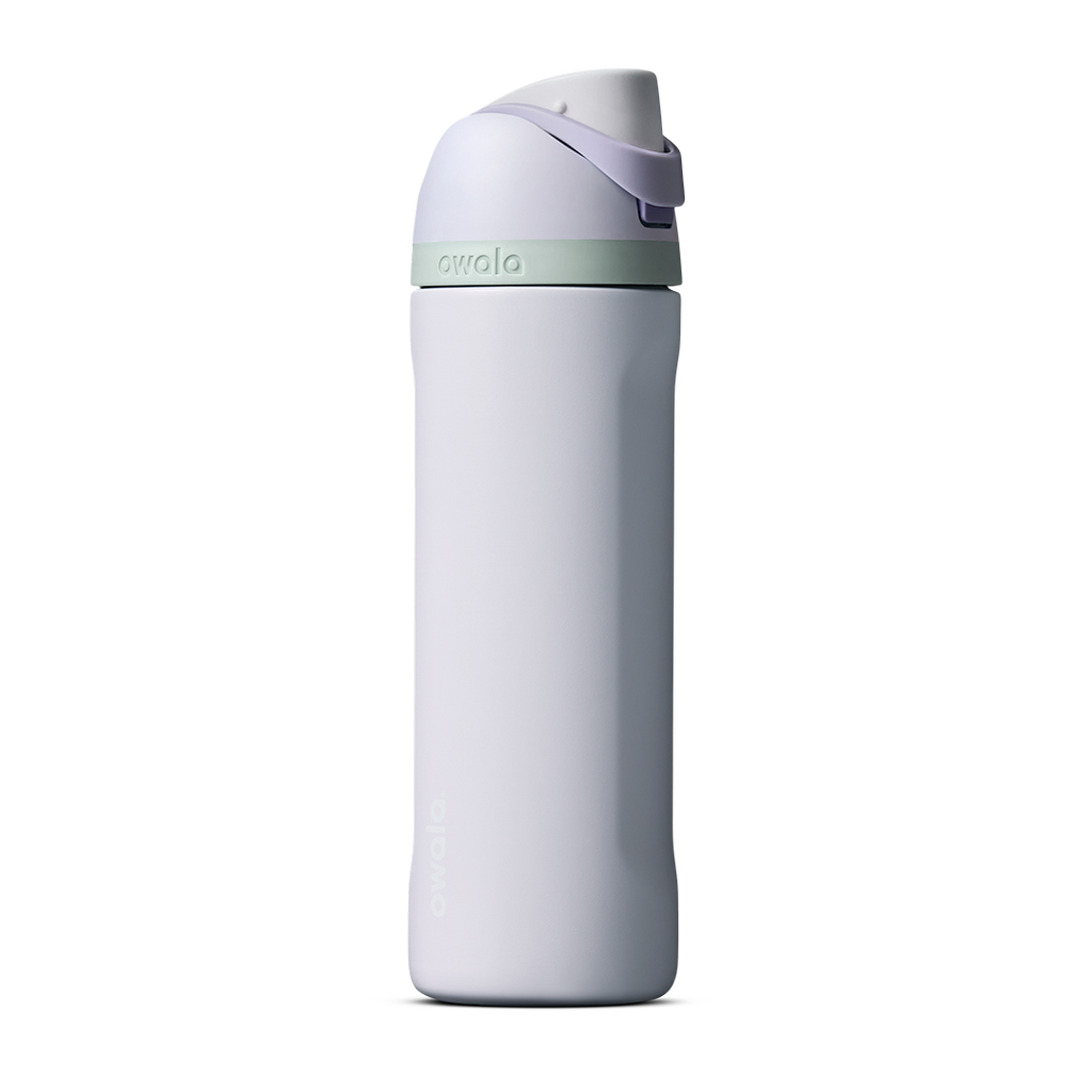 Owala FreeSip 24oz in Out of the Blue, periwinkle blue insulated bottle with matching blue-lavender flip cap and carry loop