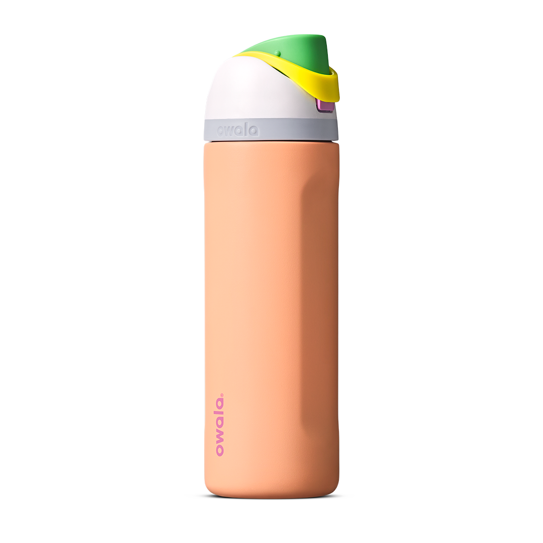 Owala FreeSip 24oz in Out of the Blue, periwinkle blue insulated bottle with matching blue-lavender flip cap and carry loop