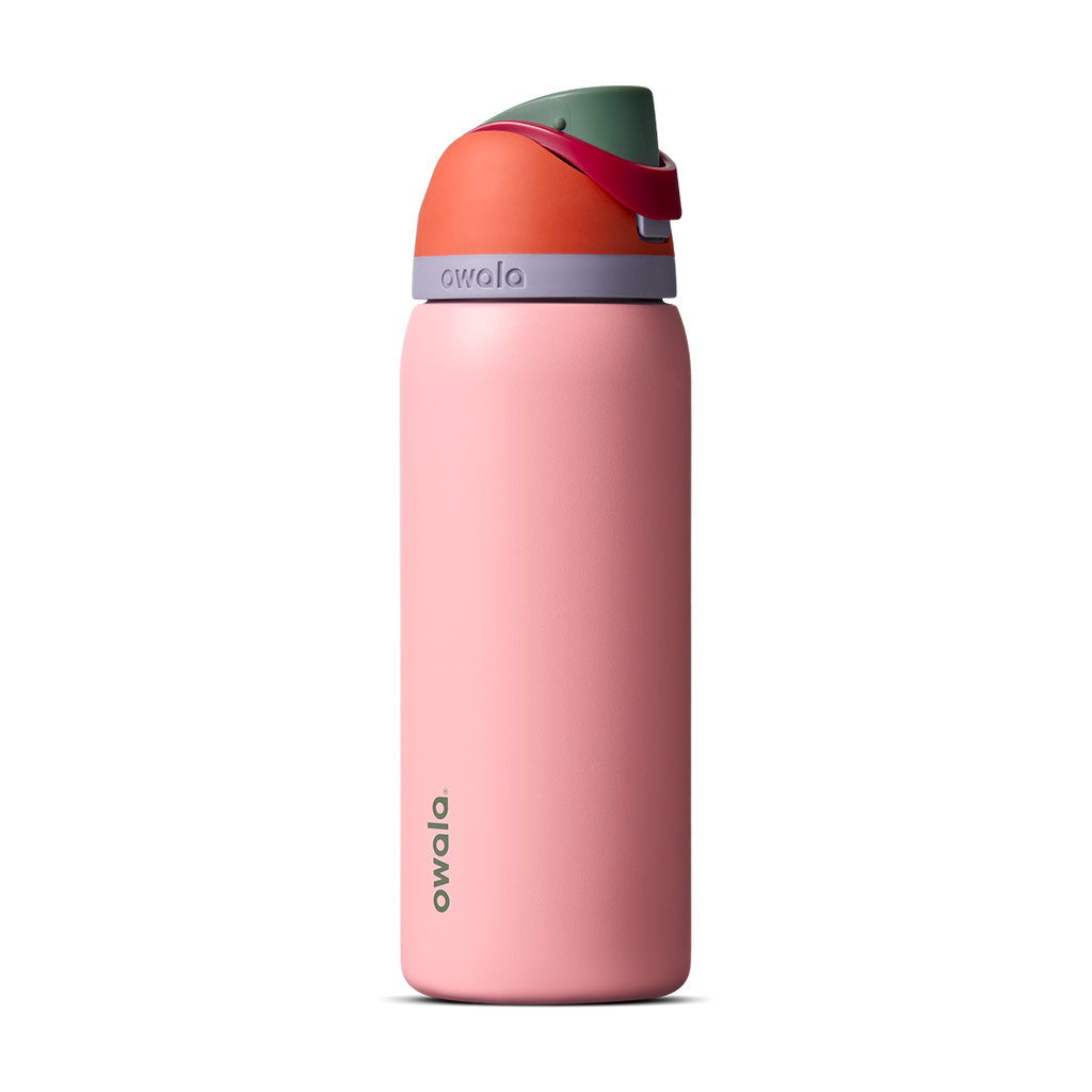 Owala FreeSip 24oz in Out of the Blue, periwinkle blue insulated bottle with matching blue-lavender flip cap and carry loop