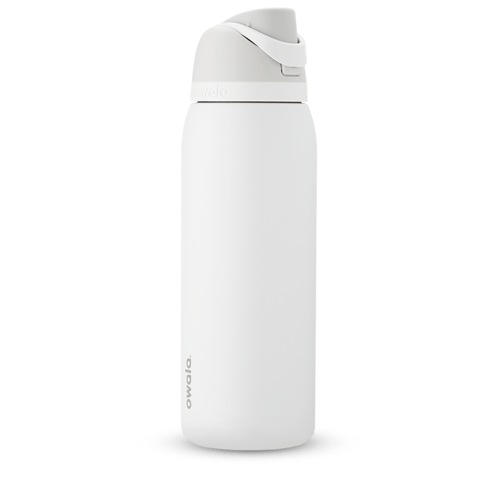 Owala FreeSip 24oz in Out of the Blue, periwinkle blue insulated bottle with matching blue-lavender flip cap and carry loop