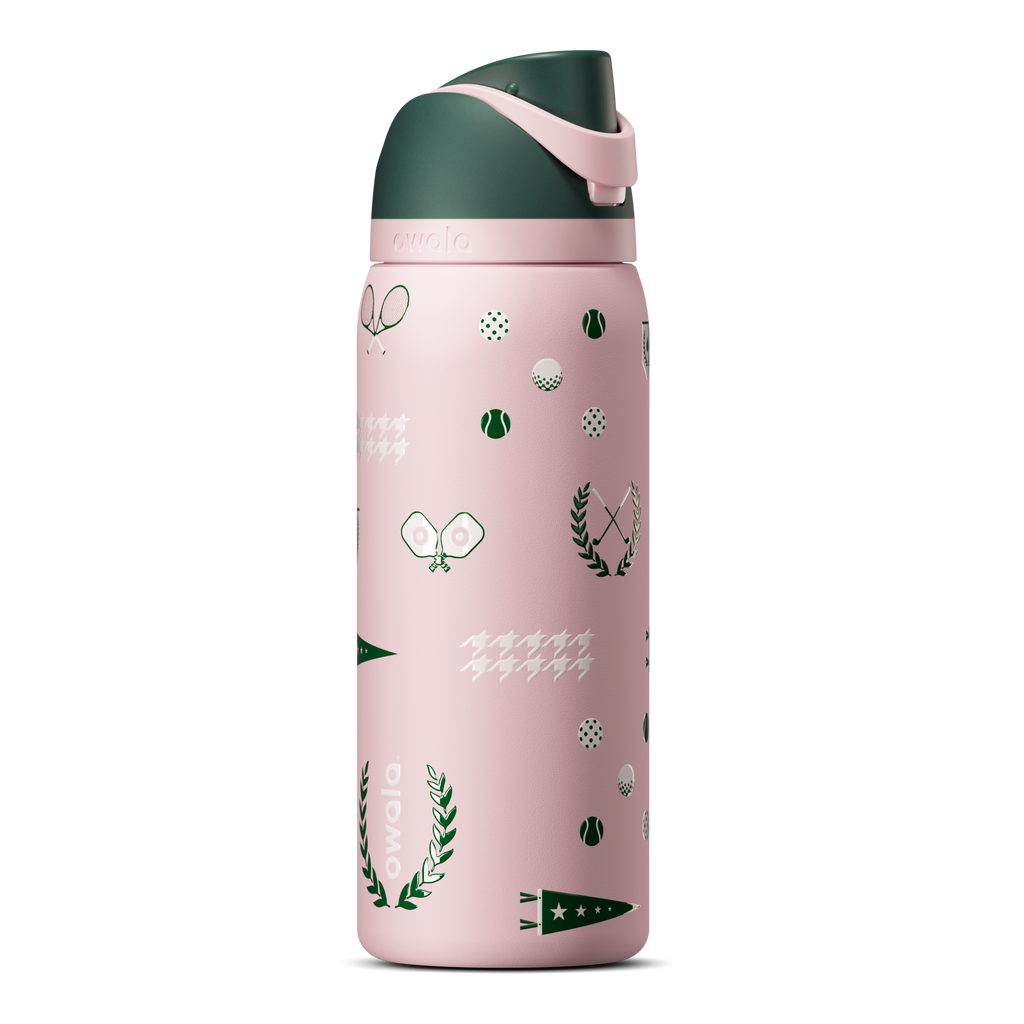 Owala FreeSip 24oz in Out of the Blue, periwinkle blue insulated bottle with matching blue-lavender flip cap and carry loop